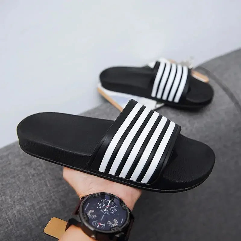 claquette homme noire