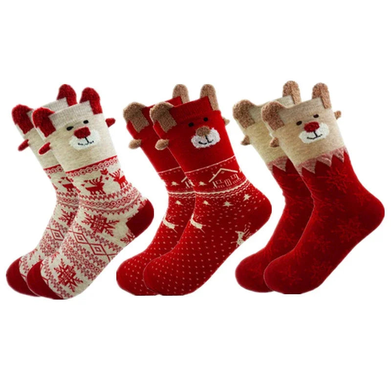 chaussettes de Noël avec design rennes et flocons
