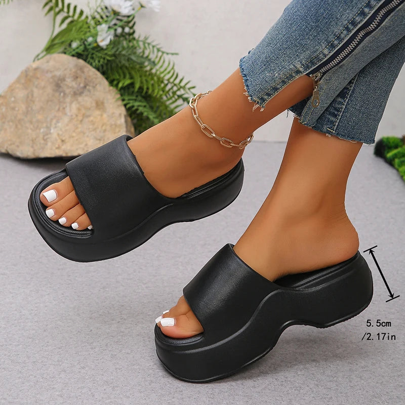 claquettes-plage-noir-femme-eva-hautes