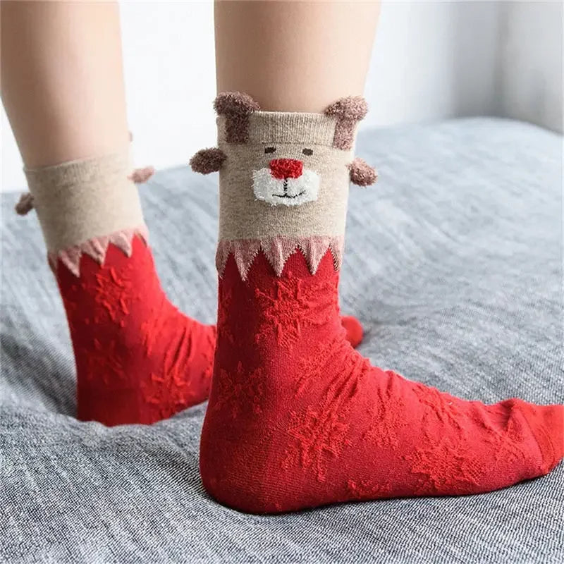 Chaussettes de Noël rouges portées 