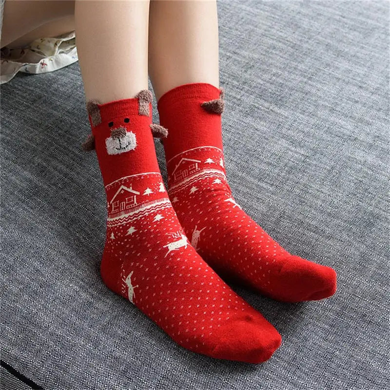 Chaussettes de Noël rouges portées 