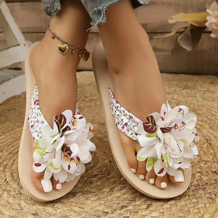 tong fleur blanche femme