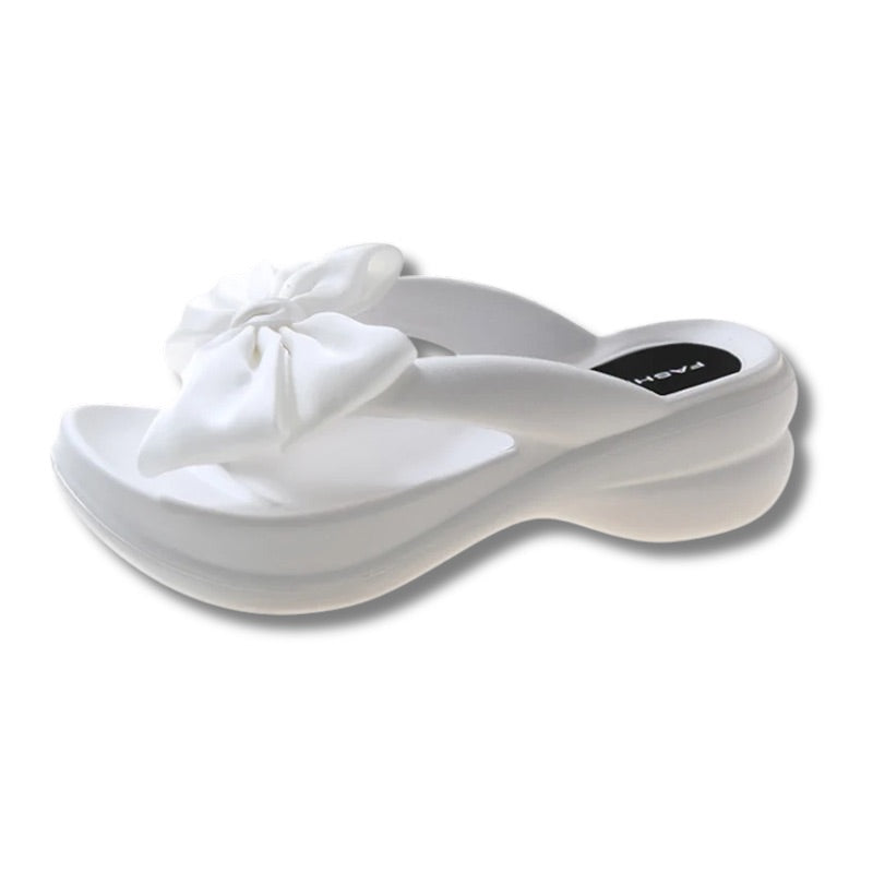 Claquette noeud papillon 