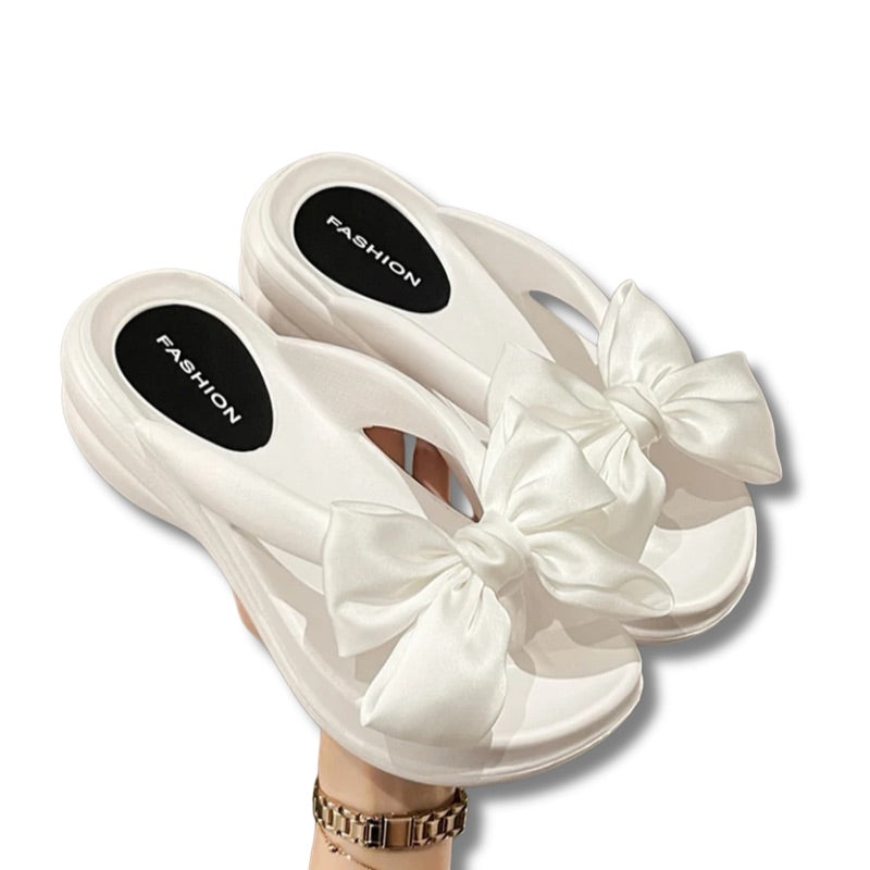 Claquette noeud papillon 
