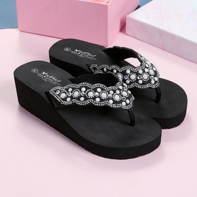 tongs compensées pour femme couleur noir